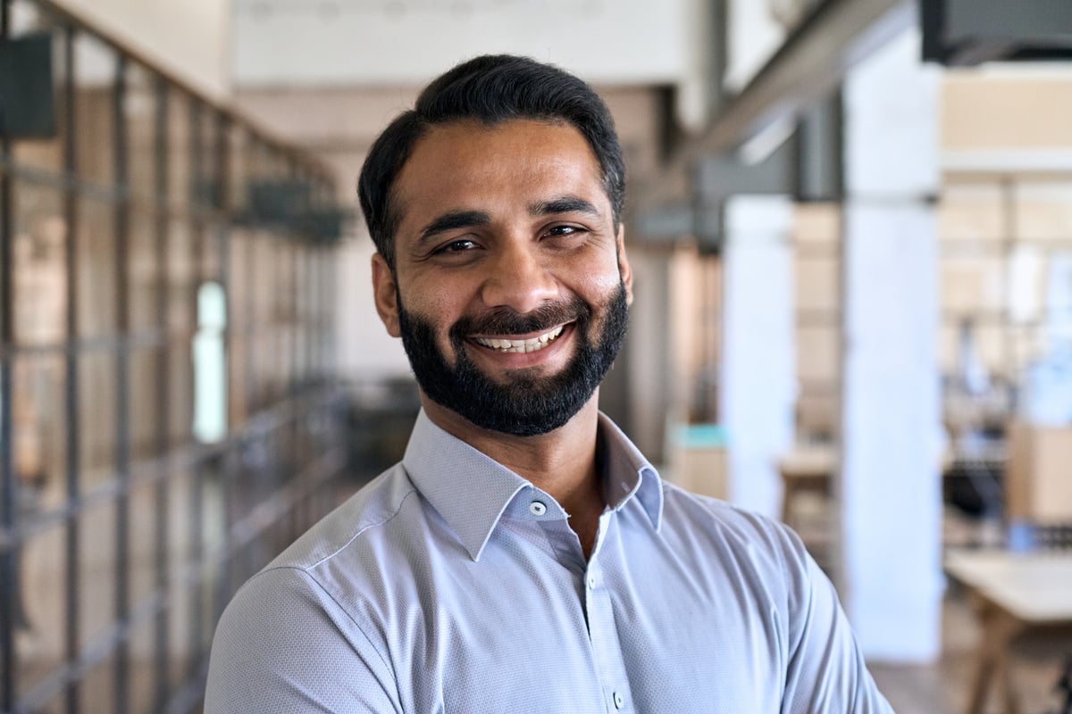 Happy Indian Business Man Leader Manager Standing in Office, Headshot Portrait.